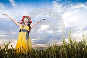 Young girl in the wheat field