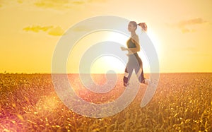 Young girl in wheat field