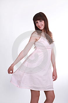 A young girl in a white dress