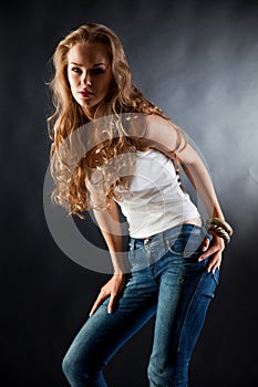 Young girl in white t-shirt and jeans