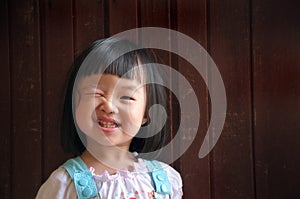 Young girl wink photo