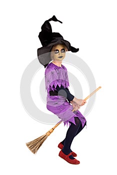 Young girl witch in Halloween