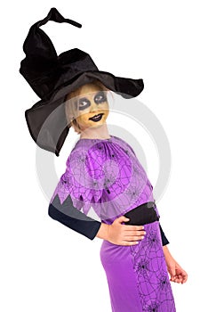 Young girl witch in Halloween