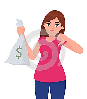 Young girl, woman or female holding/showing cash, money, currency note bag with dollar icon and gesturing or making thumb down.