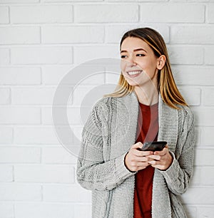 young girl woman mobile cell phone smiling casual