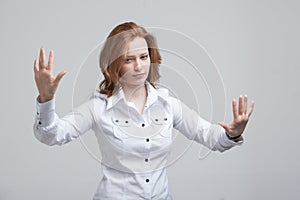 Young girl working with virtual screen