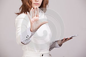 Young girl working with virtual screen