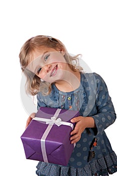 Young girl with a wrapped present