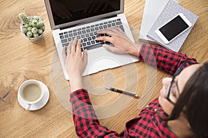 Young girl writing blog