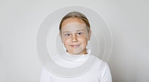 Young girl 10 years old, studio portrait photo