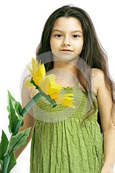 Young girl with yellow flower