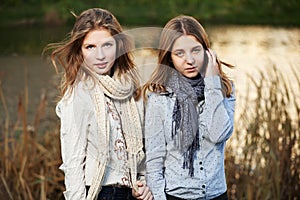 Young girls in autumn park