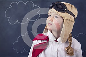 Young girls with aviator goggles and hat