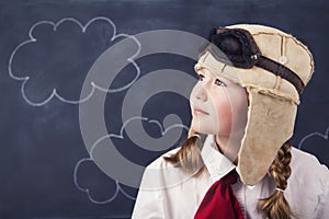 Young girls with aviator goggles and hat