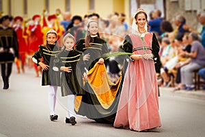 Marche, Ascoli Piceno, Reenactment, Giostra della Quintana: young girls dressed in medieval style