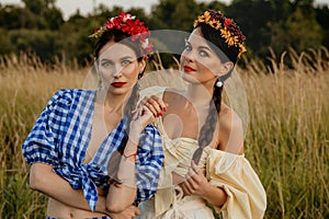 Young girls dressed in white and blue dress