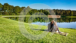 Young girls fishing at a lake