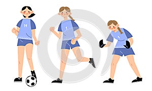 Young girls football players in blue uniform playing football outdoors in team