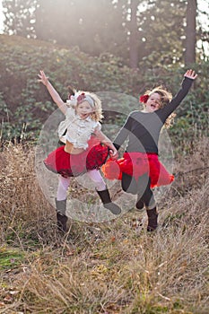 Young girls outdoors in motion