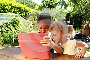 Young girls and a PC tablet