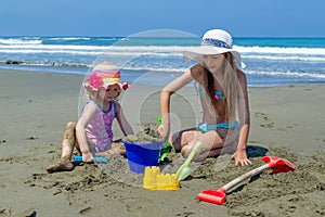 Young girls playing on the beach