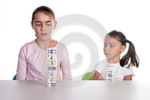 Young Girls Playing with Dominoes