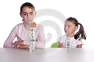 Young Girls Playing with Dominoes