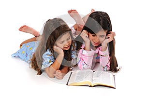 Young Girls Reading Bible