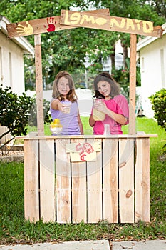 Young girls selling lemonade