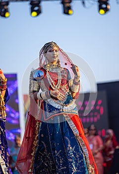 Young girls in traditional rajasthani dress in camel festival of bikaner