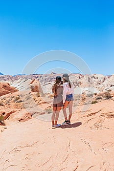 Young girls on trail at Fire Valley in Utah