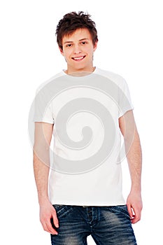 Young glad guy over white background