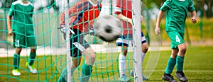 Young Goalkeeper Saves. Football Horizontal Background