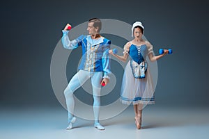 Young and graceful ballet dancers as Cinderella fairytail characters.