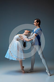 Young and graceful ballet dancers as Cinderella fairytail characters. photo