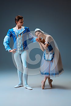 Young and graceful ballet dancers as Cinderella fairytail characters. photo