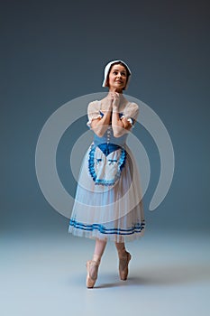 Young and graceful female ballet dancer as Cinderella fairytail character