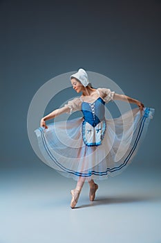 Young and graceful female ballet dancer as Cinderella fairytail character