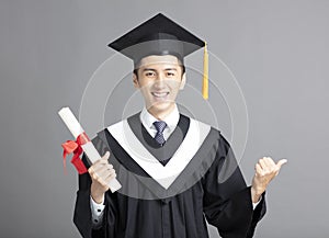 young graduated student man isolated