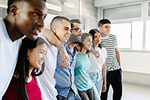 Young group of diverse of student friends standing together with teacher