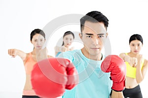Young group people in boxing class