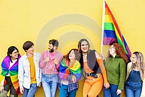 Young group of people celebrating together LGBTQI gay pride festival day