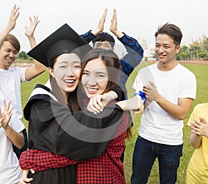 Young group Students Celebrates Graduation in school