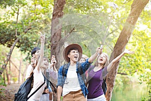 young group Taking Selfie by Smart Phone