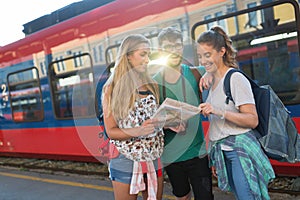 Young group of travelling tourists photo