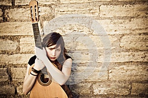 Young guitar performer photo