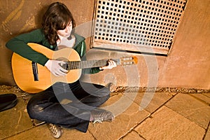 Young guitar performer