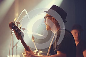 A young guitarist performing on stage. This concert was created for the sole purpose of this photo shoot, featuring 300