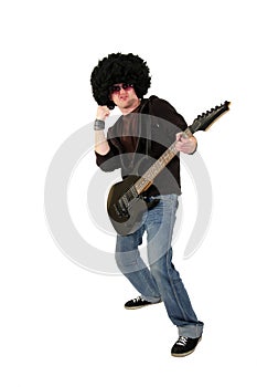 Young guitarist raising his fist