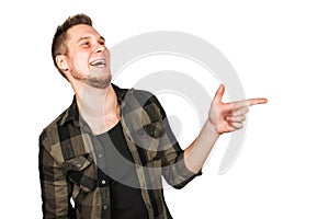 Young guy with beard taunts and shows finger up isolated on white background